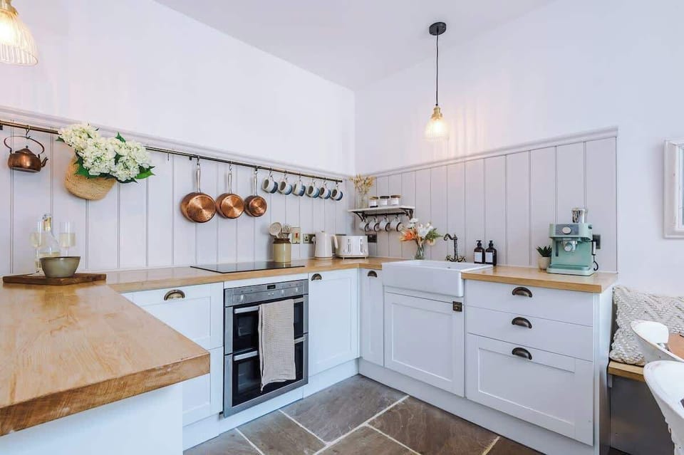 Beautiful. elegant and full kitchen with everything you need.