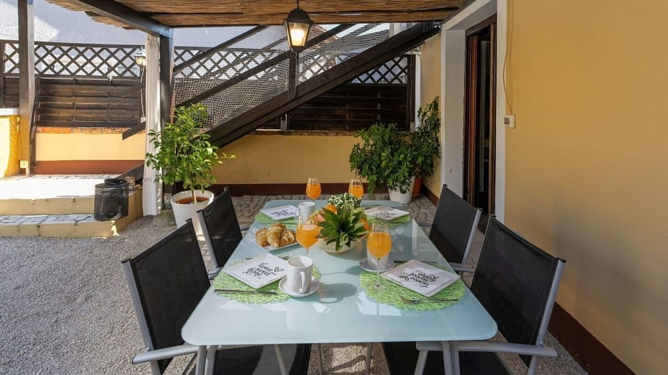 The outdoor dining area of Casa Dvi Mendule