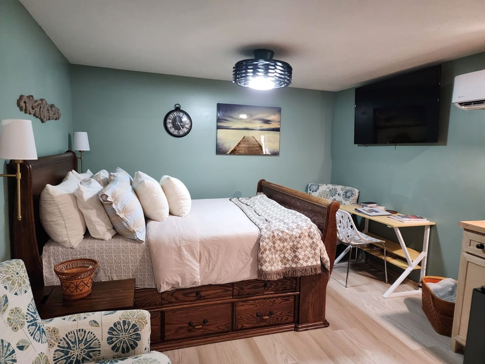 Queen bed with 55inch smart tv