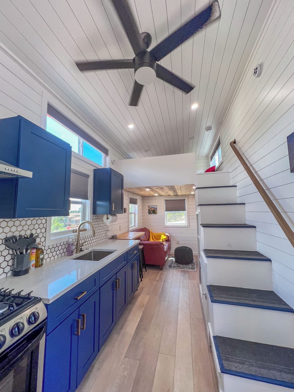 Kitchen and stairs to loft bed