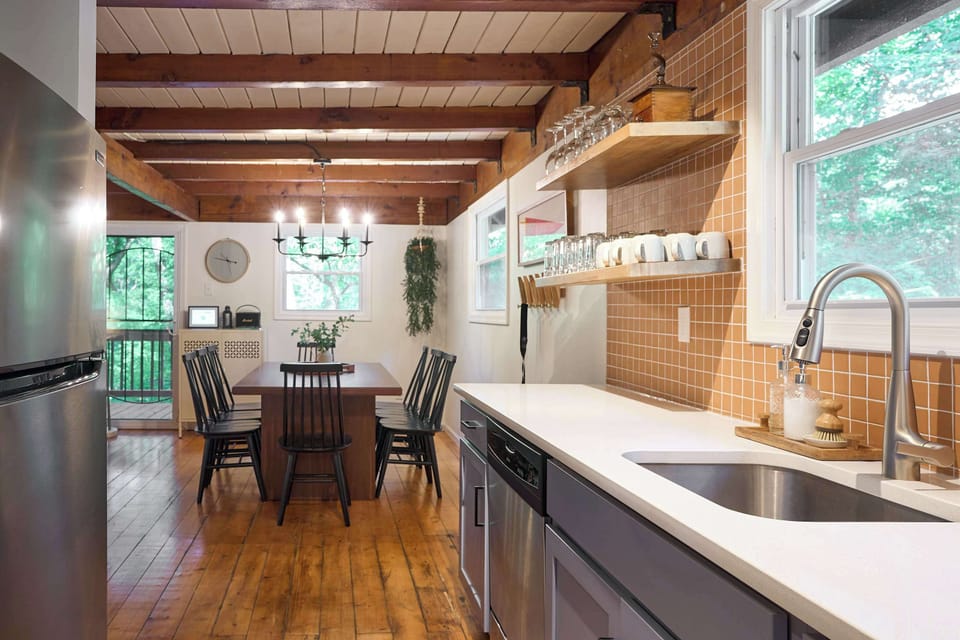 Seamlessly transition from cooking to dining with our open layout, where the kitchen flows effortlessly into the dining area