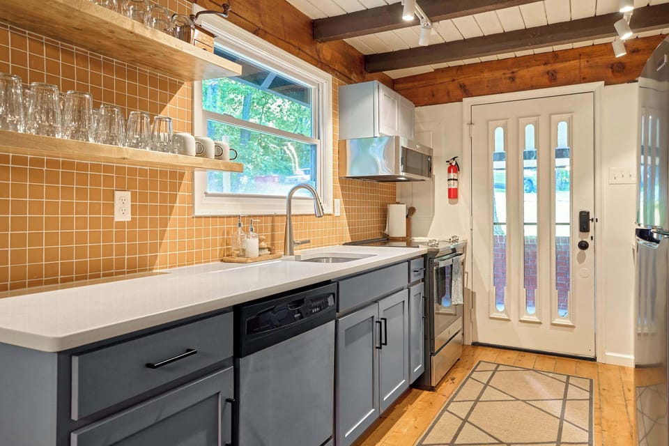 Discover the joy of cooking in our fully stocked kitchen, where every essential is at your fingertips