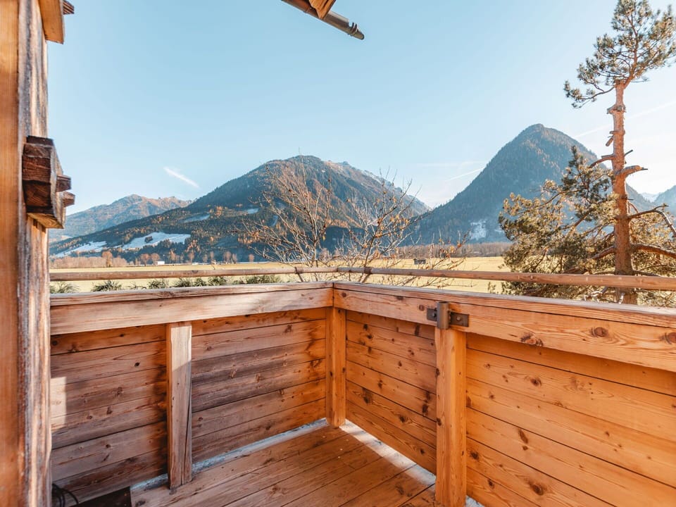 Sky, Mountain, Wood, Fence, Wood Stain, Landscape, Natural Landscape, Hardwood, Real Estate, Mountainous Landforms