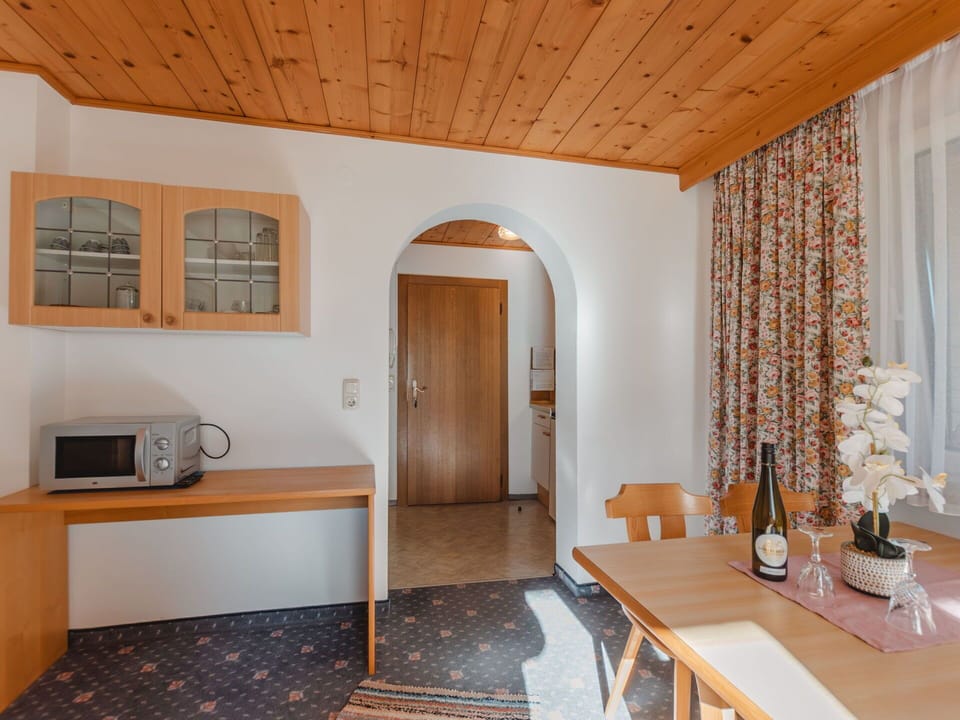 Table, Furniture, Property, Building, Wood, Cabinetry, Interior Design, Lighting, Orange, Door