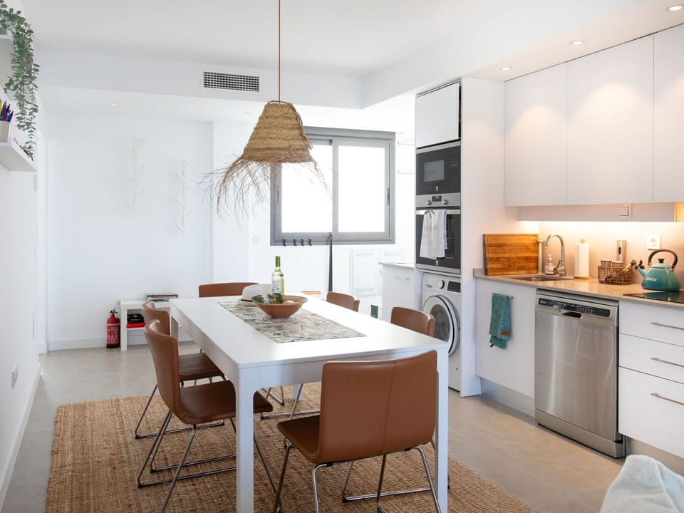 Furniture, Property, Cabinetry, Table, Countertop, Wood, Interior Design, Kitchen Stove, Kitchen, Chair