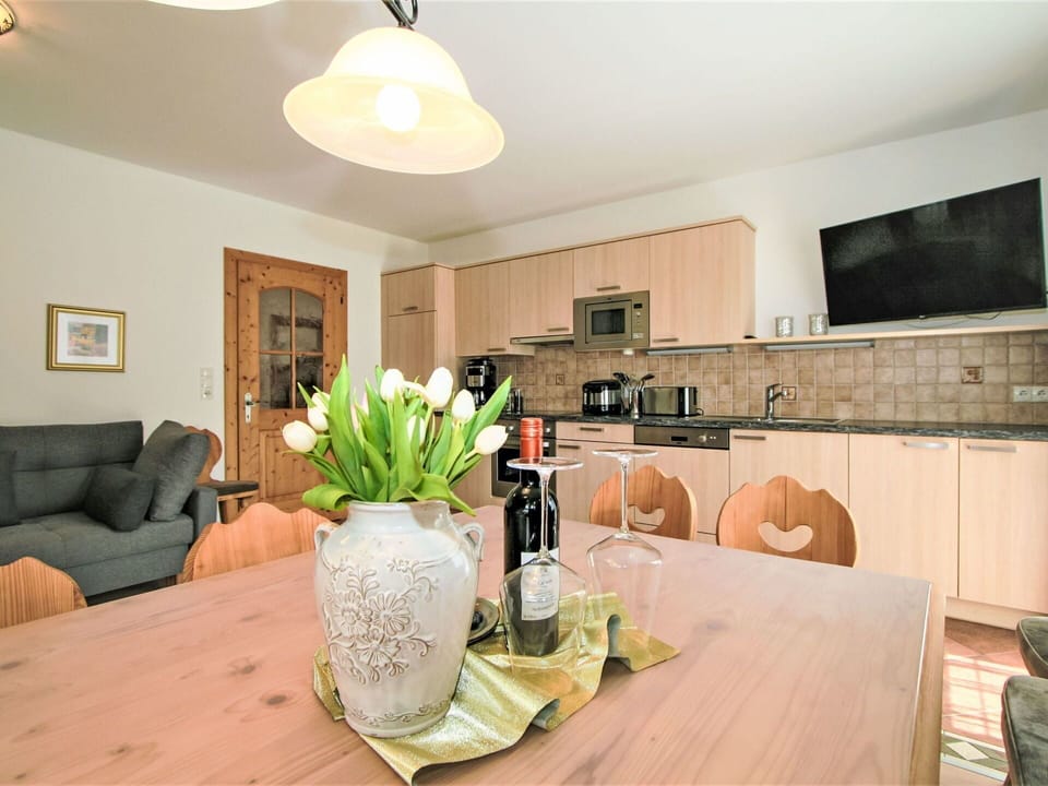 Furniture, Property, Plant, Flower, Couch, Table, Interior Design, Wood, Cabinetry, Countertop