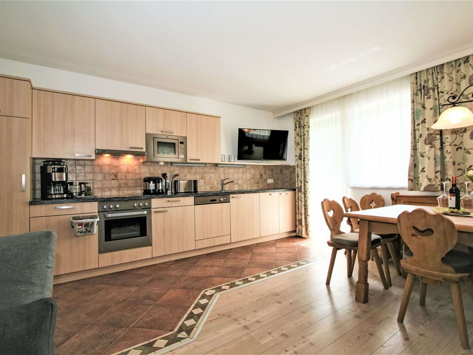 Cabinetry, Furniture, Countertop, Wood, Floor, Kitchen, Flooring, Interior Design, Living Room, Kitchen Stove