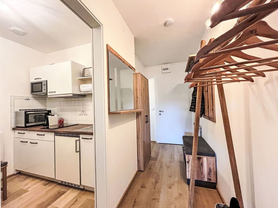 Cabinetry, Property, Building, Countertop, Wood, Interior Design, Flooring, Drawer, Floor, Hall