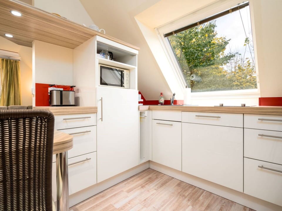 Cabinetry, Furniture, Property, Building, Countertop, Wood, Interior Design, Kitchen, Window, Flooring