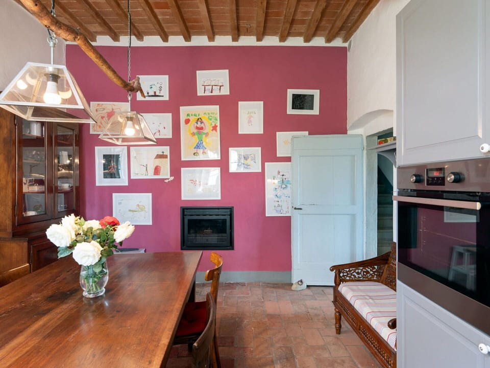 Table, Flower, Furniture, Cabinetry, Wood, Interior Design, Picture Frame, Purple, Houseplant, Floor