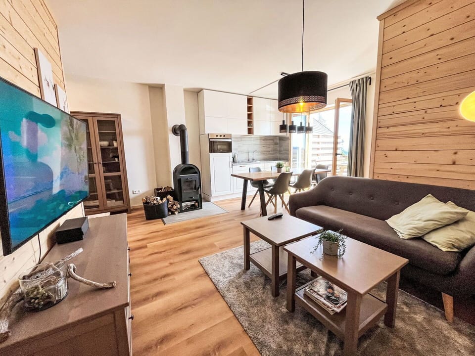 Table, Couch, Furniture, Property, Building, Picture Frame, Interior Design, Wood, Lighting, Living Room
