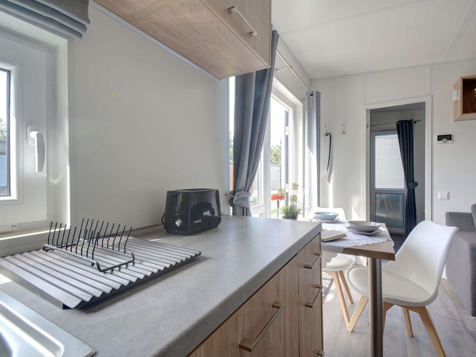 Furniture, Cabinetry, Table, Wood, Window, Chair, Building, Floor