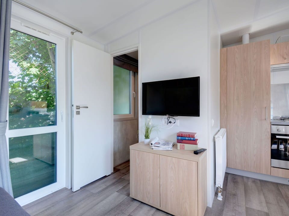 Cabinetry, Wood, Interior Design, Window, Building, Floor, Shade, Countertop, Plant, Flooring