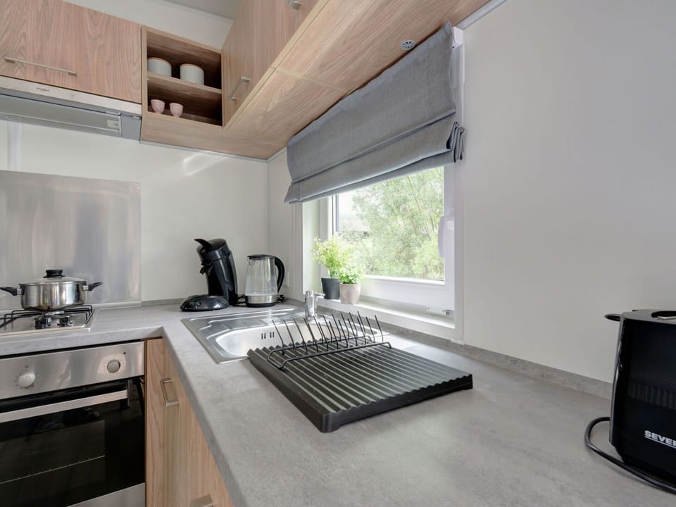 Cabinetry, Countertop, Kitchen Stove, Kitchen, Wood, Kitchen Appliance, Home Appliance, Kitchen Sink, Floor