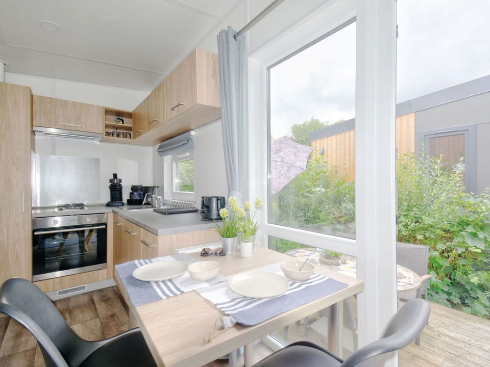 Furniture, Property, Table, Building, Plant, Chair, Wood, Window, Cabinetry, Architecture