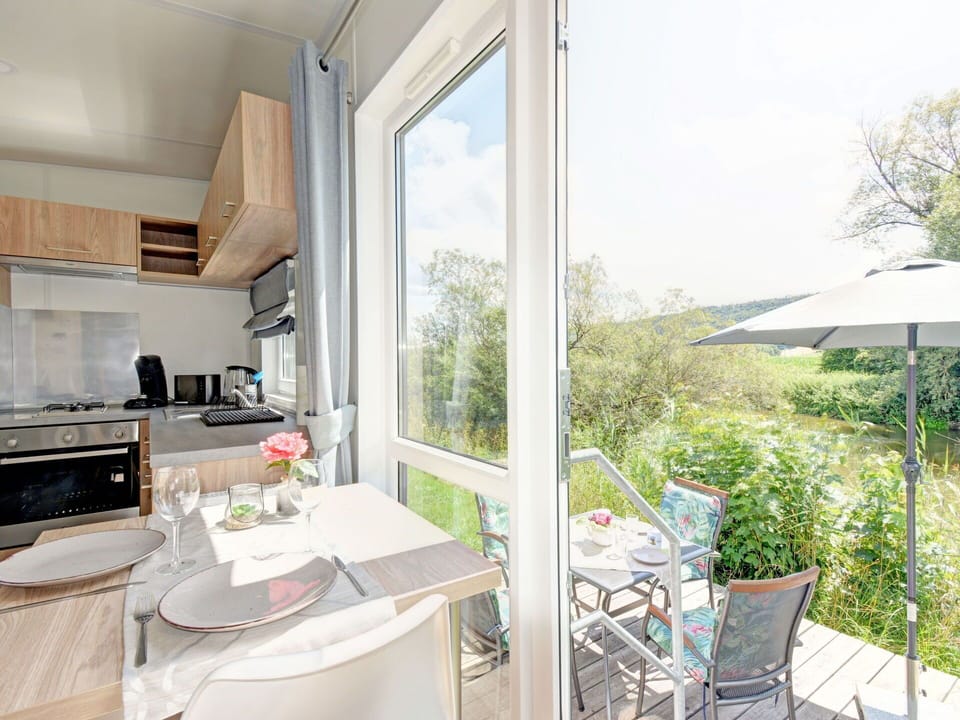 Plant, Building, Furniture, Property, Table, Chair, Window, Shade, Sky, Countertop