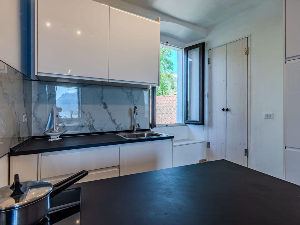 Cabinetry, Countertop, Kitchen Sink, Property, Sink, Tap, Building, Kitchen, Kitchen Stove, Wood