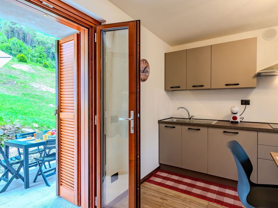 Property, Furniture, Cabinetry, Building, Wood, Interior Design, Flooring, Floor, Plant