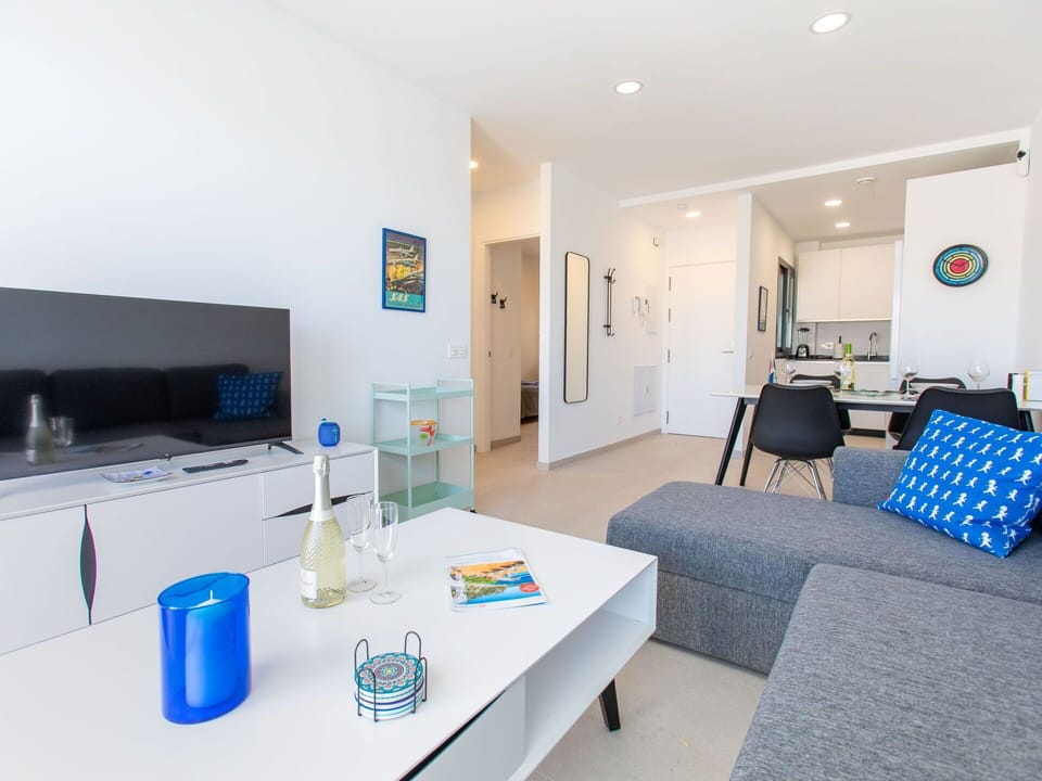 Furniture, Table, Blue, Building, Interior Design, Couch, Floor, House, Television, Flooring