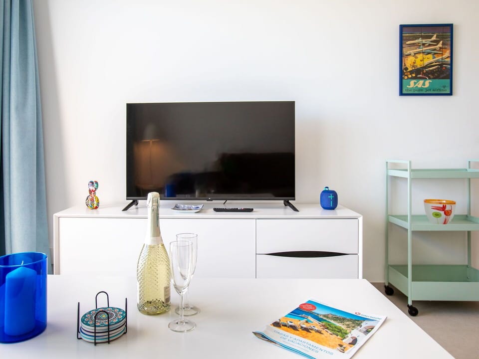 Table, Property, Furniture, Blue, Building, Azure, Computer Desk, Textile, Interior Design, Lighting