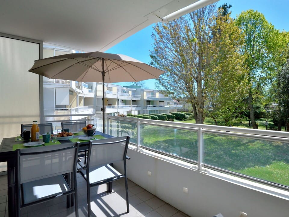 Furniture, Table, Building, Plant, Sky, Chair, Shade, Interior Design, Tree, House