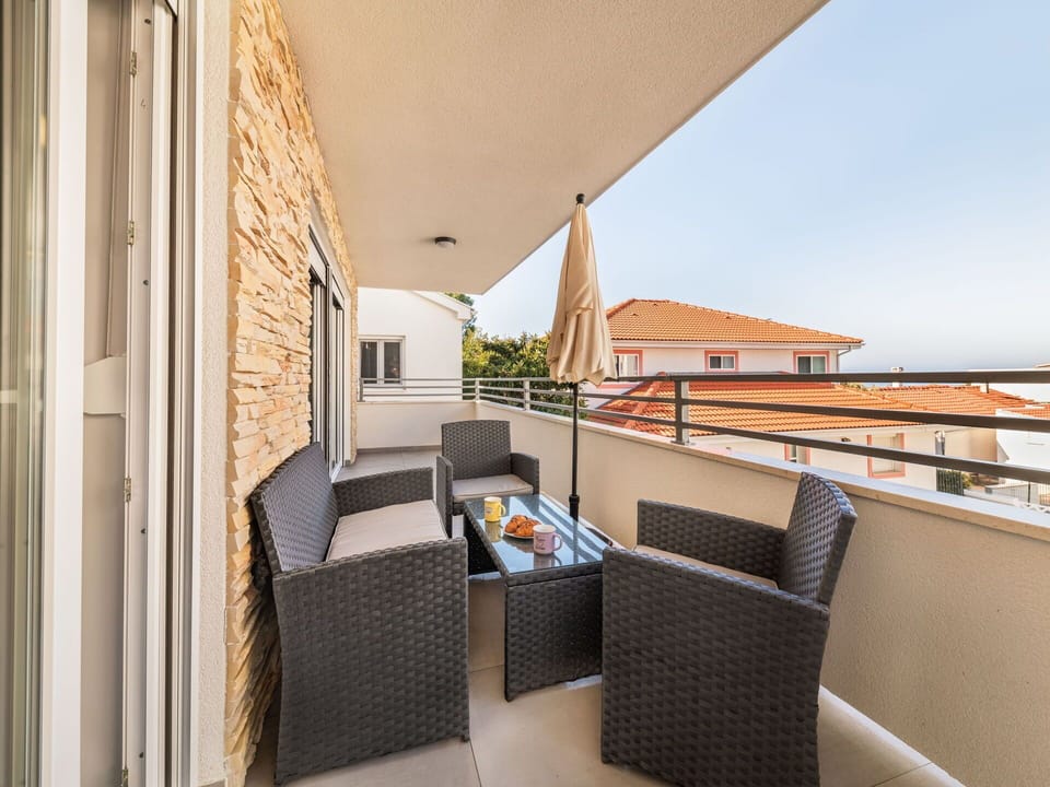 Property, Furniture, Sky, Building, Interior Design, Shade, Comfort, Chair, Condominium, Floor