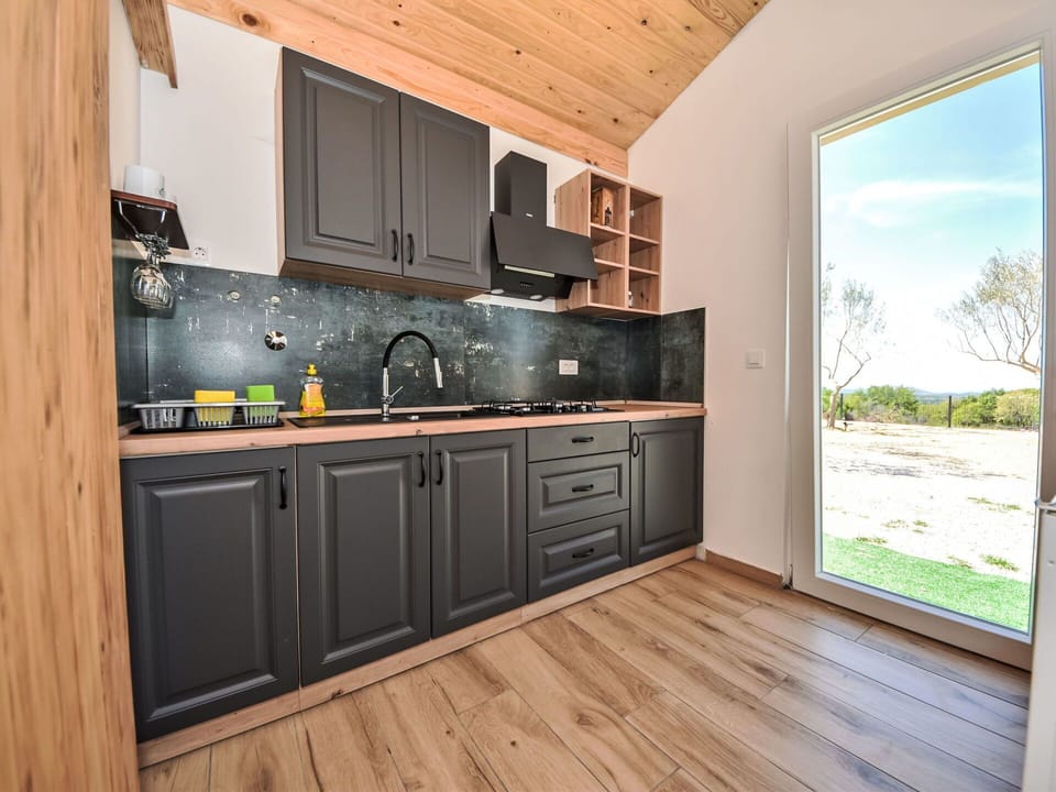 Cabinetry, Countertop, Property, Kitchen Stove, Drawer, Kitchen, Wood, Interior Design, Kitchen Appliance, Building