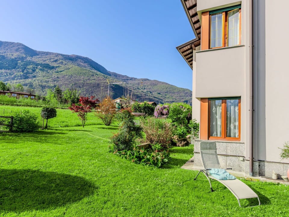 Plant, Sky, Building, Window, Azure, Mountain, Land Lot, Natural Landscape, Tree, Grass