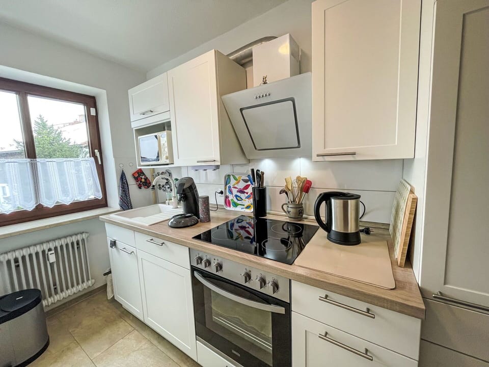 Cabinetry, Countertop, Kitchen Sink, Property, Sink, Tap, Kitchen, Kitchen Stove, Plumbing Fixture, Window