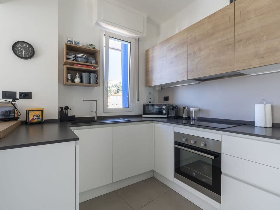 Cabinetry, Property, Countertop, Kitchen Stove, Kitchen Sink, Sink, Wood, Interior Design, Kitchen Appliance, Home Appliance
