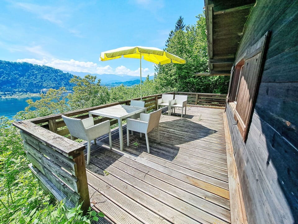 Sky, Property, Cloud, Building, Plant, Shade, Outdoor Furniture, Wood, Architecture, Vegetation