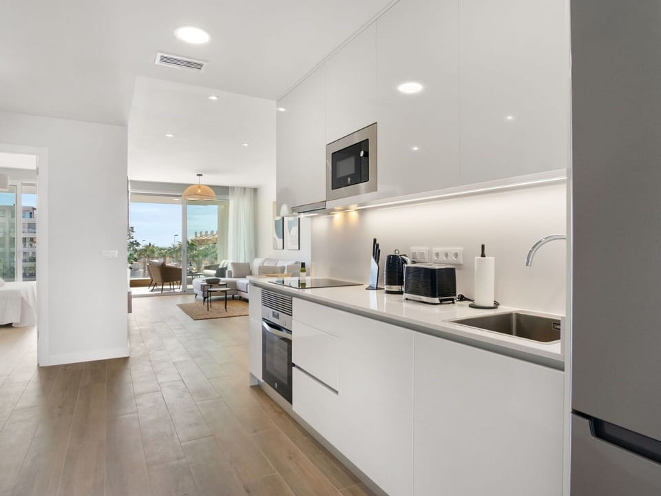 Cabinetry, Countertop, Building, Kitchen Appliance, Wood, Kitchen, Home Appliance, Houseplant, Flooring
