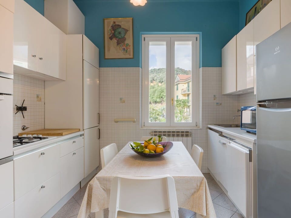 Furniture, Kitchen, Interior Design, Kitchen Appliance, Major Appliance, Flooring, Countertop, Ceiling, Floor, Cabinetry