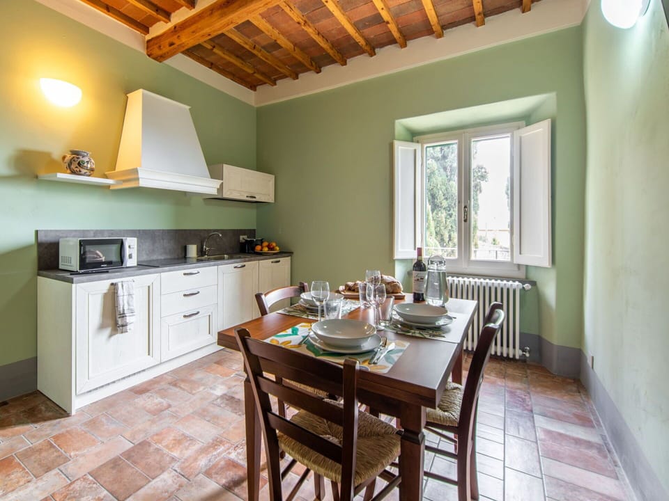 Furniture, Property, Cabinetry, Table, Countertop, Chair, Wood, Lighting, Interior Design, Kitchen Stove