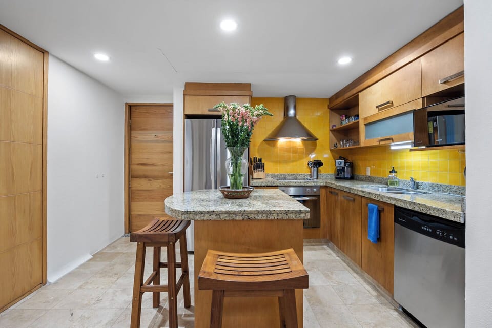 The island provides extra counter space for easy meal prep