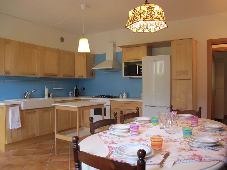 Furniture, Cabinetry, Property, Table, Countertop, Sink, Lighting, Interior Design, Wood, Tap