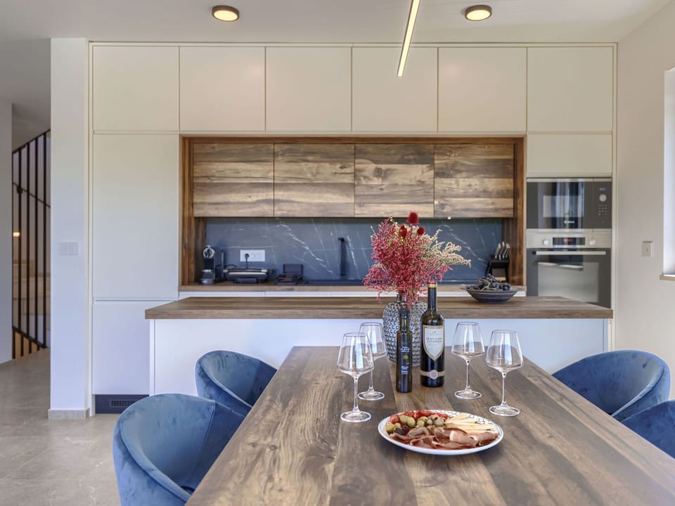 Table, Furniture, Property, Tableware, Cabinetry, Wood, Lighting, Interior Design, Chair, Kitchen