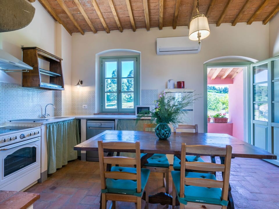 Table, Furniture, Property, Blue, Wood, Window, Cabinetry, Interior Design, Lighting, Houseplant