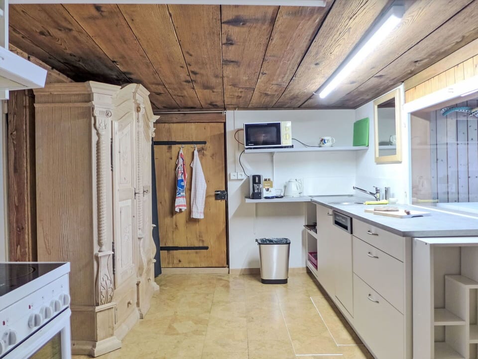 Cabinetry, Property, Furniture, Sink, Countertop, Wood, Interior Design, Tap, Flooring, Window