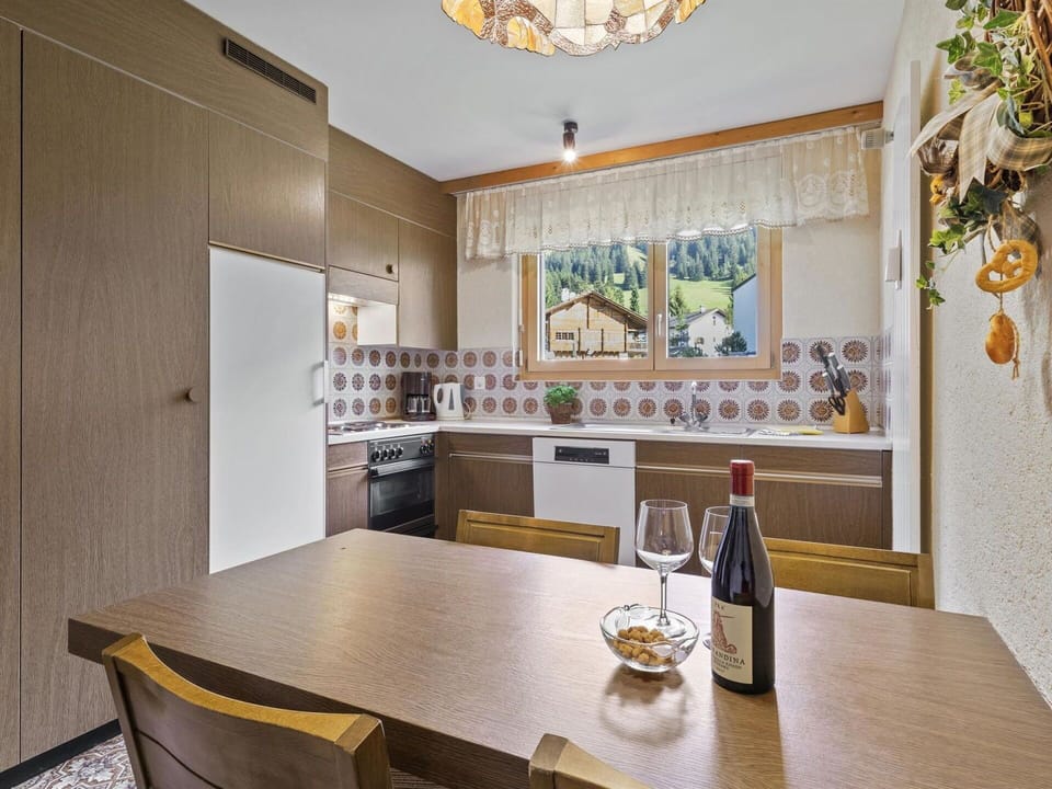Table, Property, Furniture, Cabinetry, Bottle, Wood, Lighting, Chair, Interior Design, Building