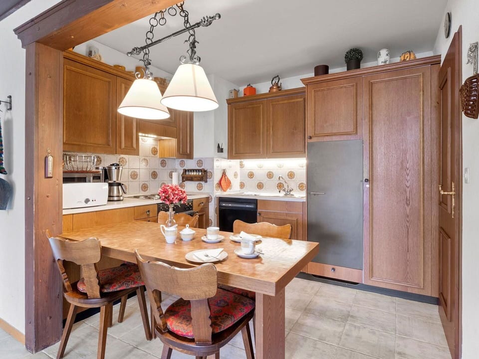Table, Cabinetry, Furniture, Countertop, Chair, Wood, Lighting, Home Appliance, Kitchen, Interior Design