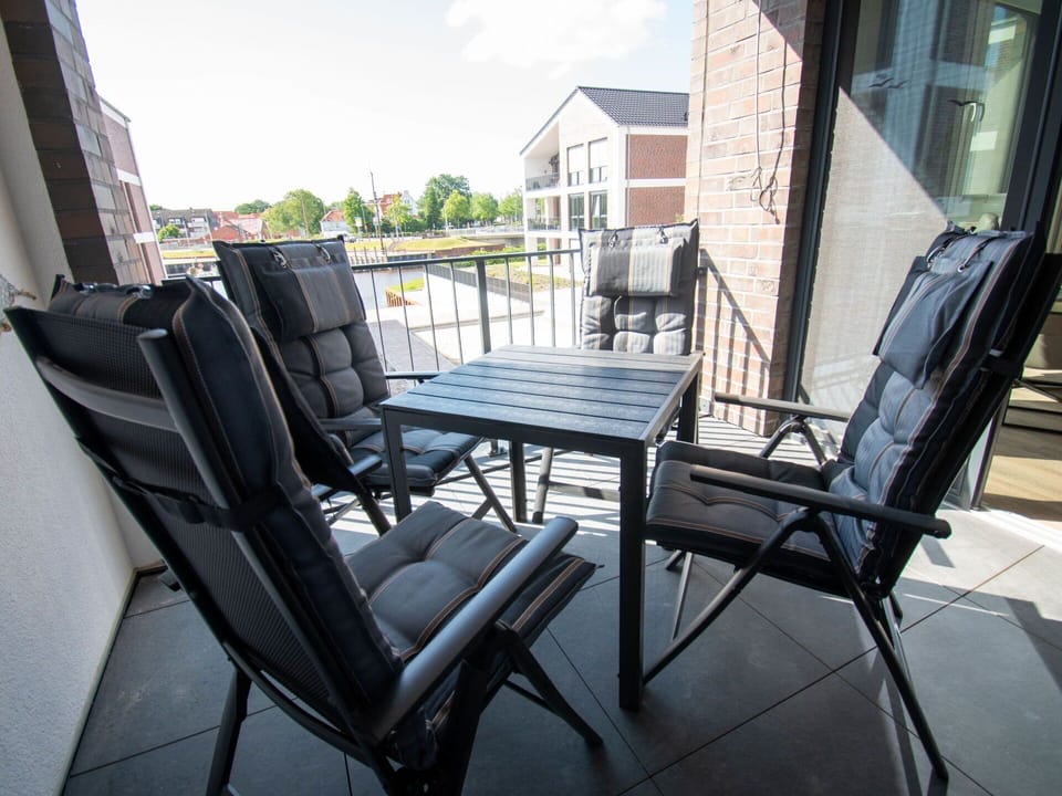 Furniture, Table, Sky, Cloud, Building, Chair, Window, Wood, Outdoor Furniture, Outdoor Table