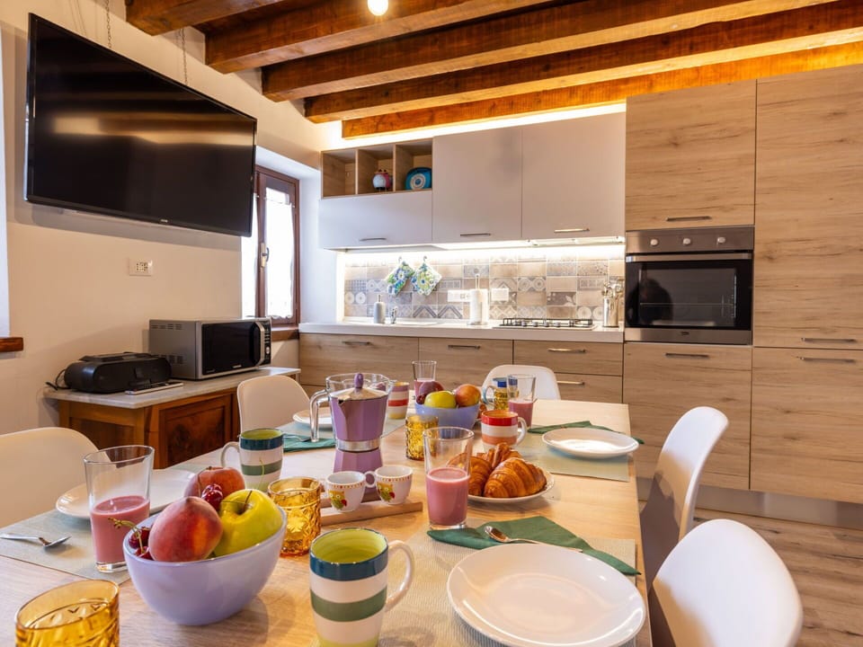 Tableware, Cabinetry, Countertop, Table, Dishware, Kitchen, Kitchen Appliance, Interior Design, Chair, Food