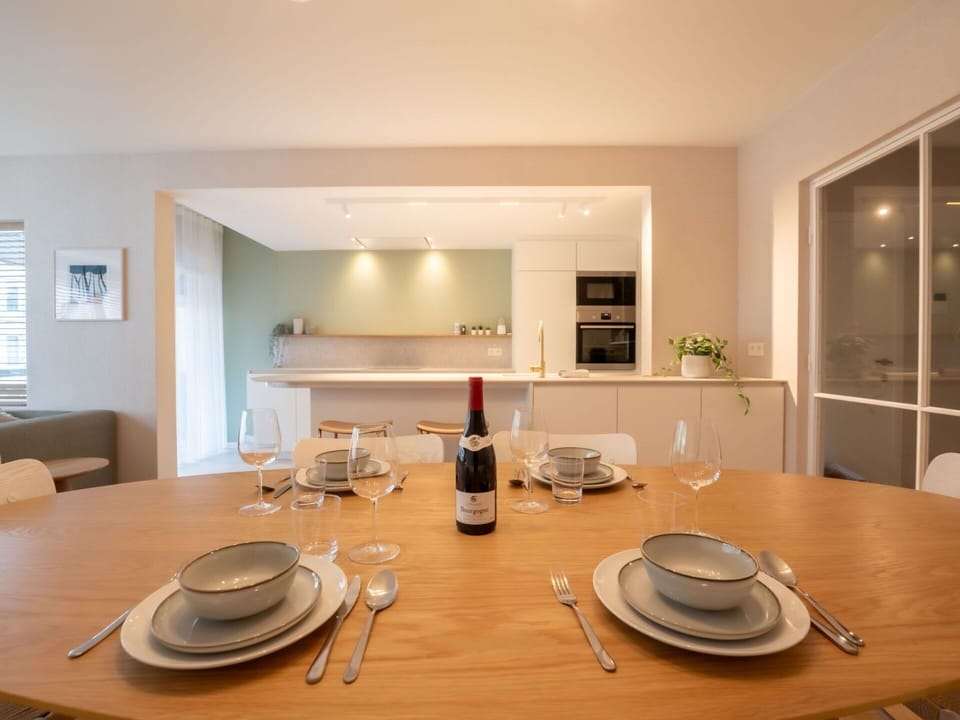 Table, Furniture, Tableware, Cabinetry, Wood, Chair, Interior Design, Flooring, Drinkware, Architecture