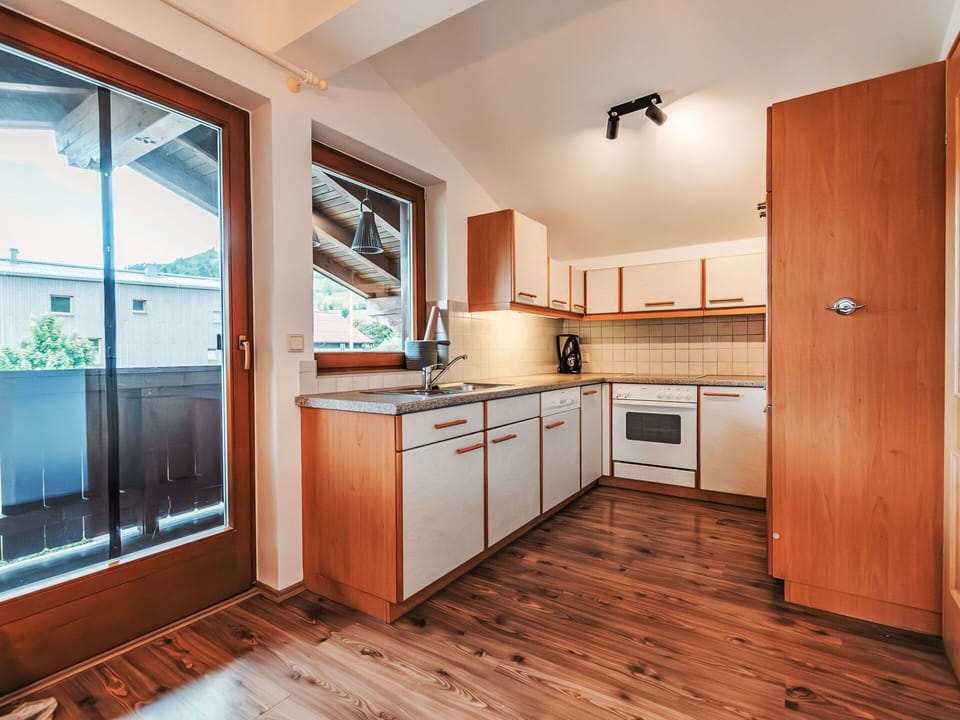 Cabinetry, Countertop, Furniture, Drawer, Kitchen, Wood, Lighting, Kitchen Stove, Interior Design, Architecture