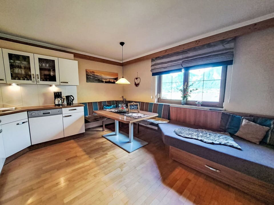Furniture, Couch, Property, Table, Wood, Picture Frame, Interior Design, Lighting, Countertop, Window