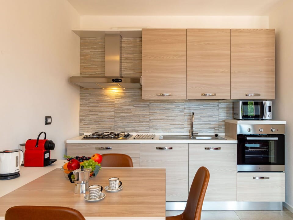 Furniture, Cabinetry, Countertop, Kitchen Stove, Wood, Kitchen, Lighting, Building, Interior Design, Flooring