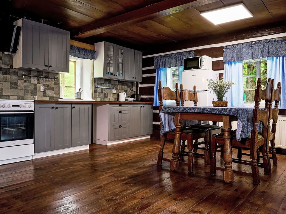Furniture, Cabinetry, Wood, Table, Interior Design, Floor, Countertop, Flooring, Kitchen Stove, Building