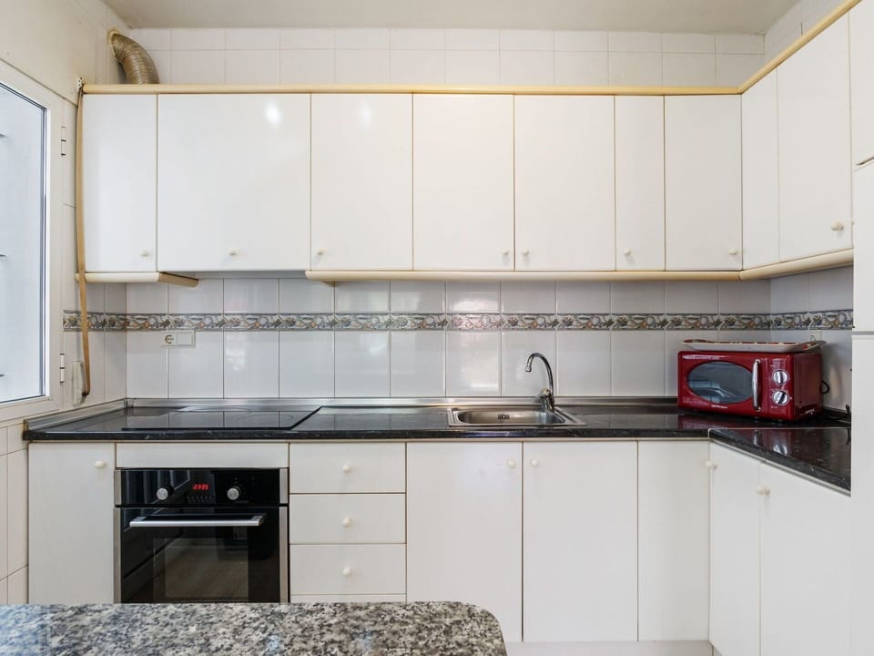Cabinetry, Countertop, Property, Kitchen Sink, Building, Sink, Kitchen Stove, Tap, Kitchen, Wood