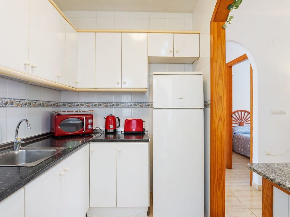 Cabinetry, Furniture, Kitchen Sink, Building, Sink, Kitchen Appliance, Countertop, Kitchen Stove, Kitchen, Home Appliance